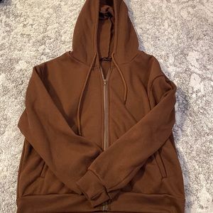 brown zip up sweater
